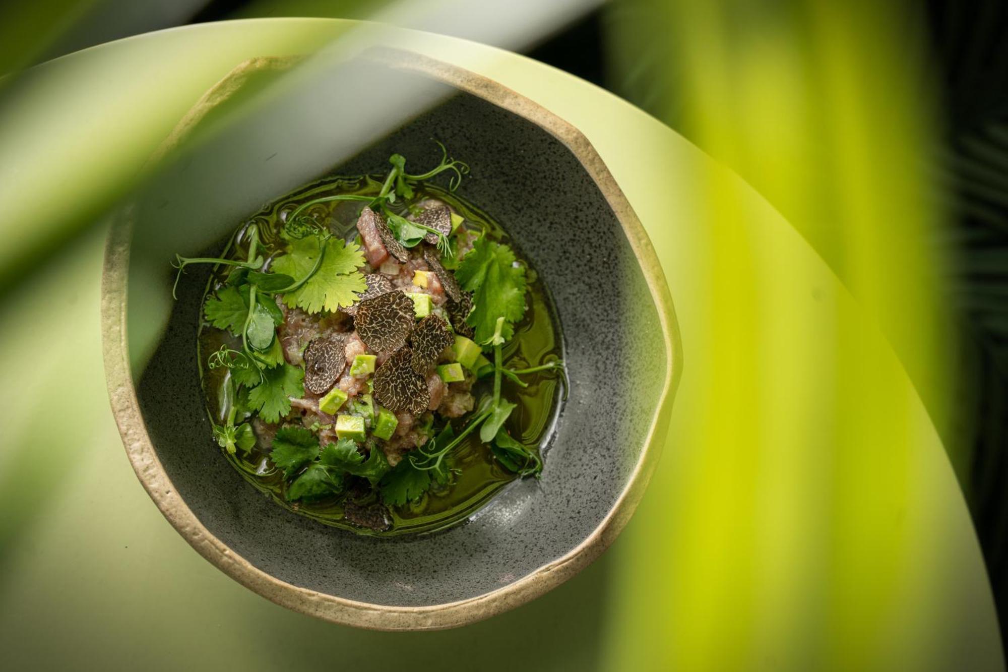 Falkensteiner Boutique Hotel Prague Luaran gambar A dish of olive oil with herbs